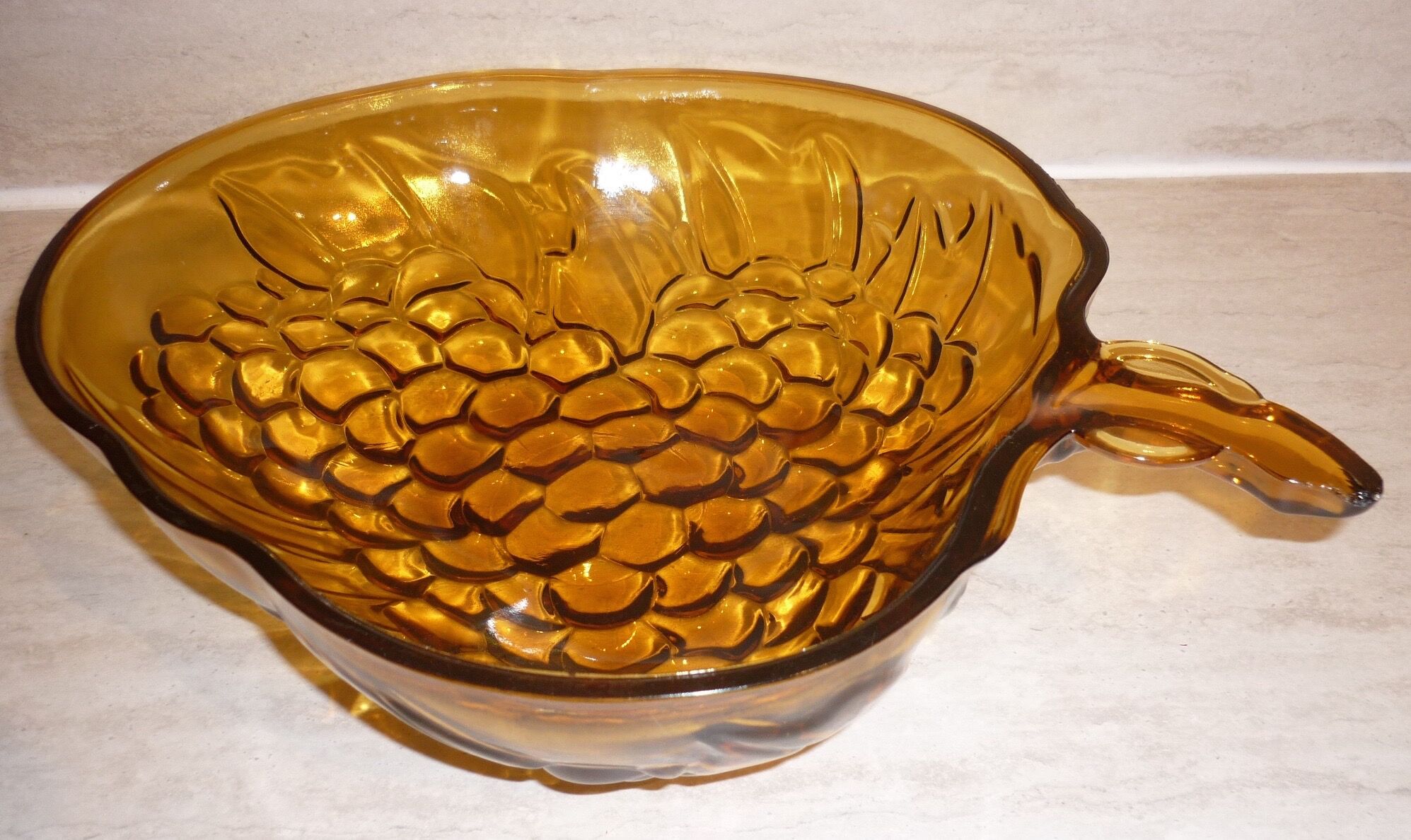 dish fruit cluster in amber molded glass