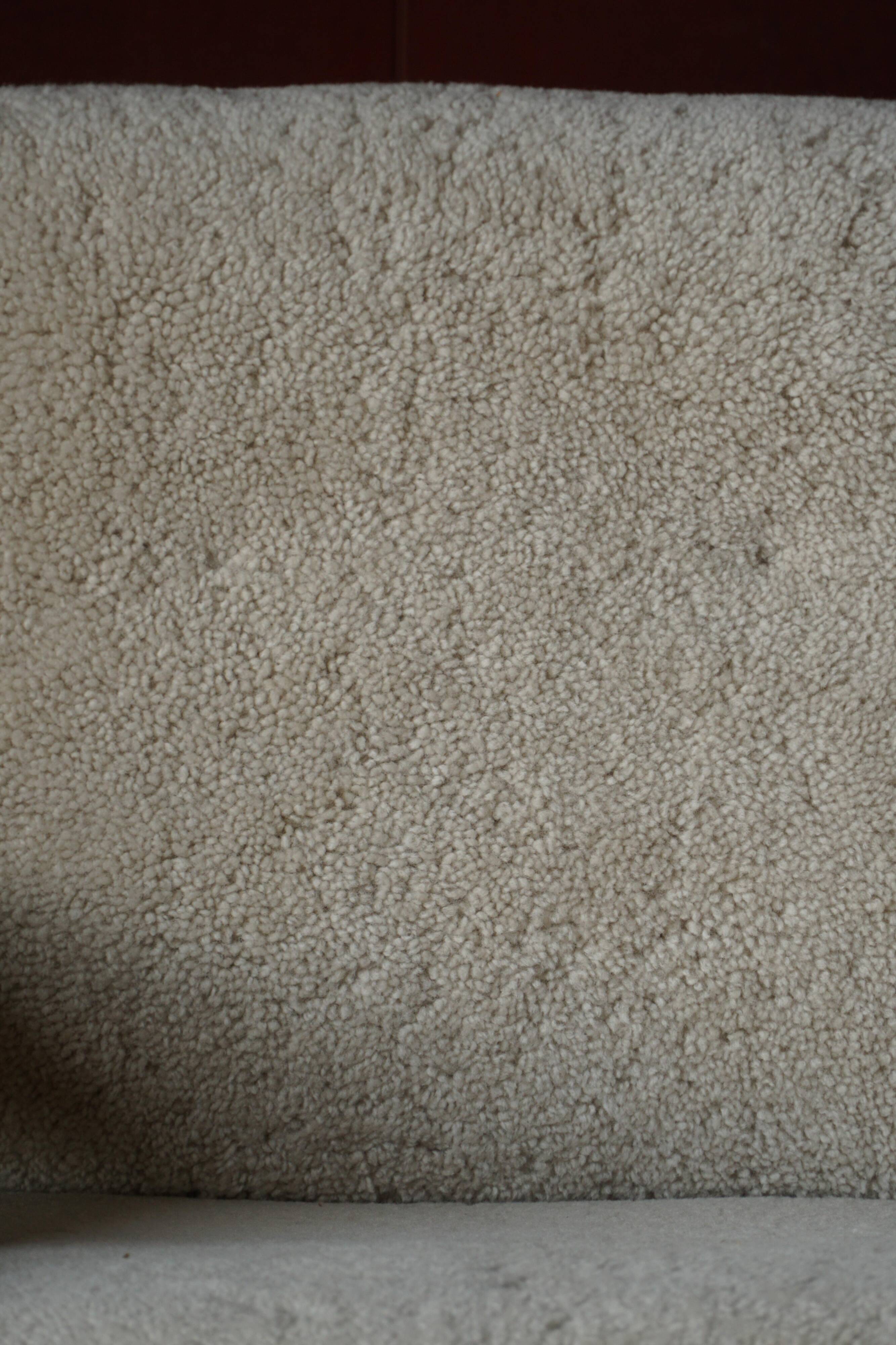 Henning Kjærnulf, lounge chairs in oak and lambswool, mid-century Danish, 1960s.