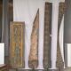 Rectangular Indonesian construction element with blue and yellow plant in carved wood