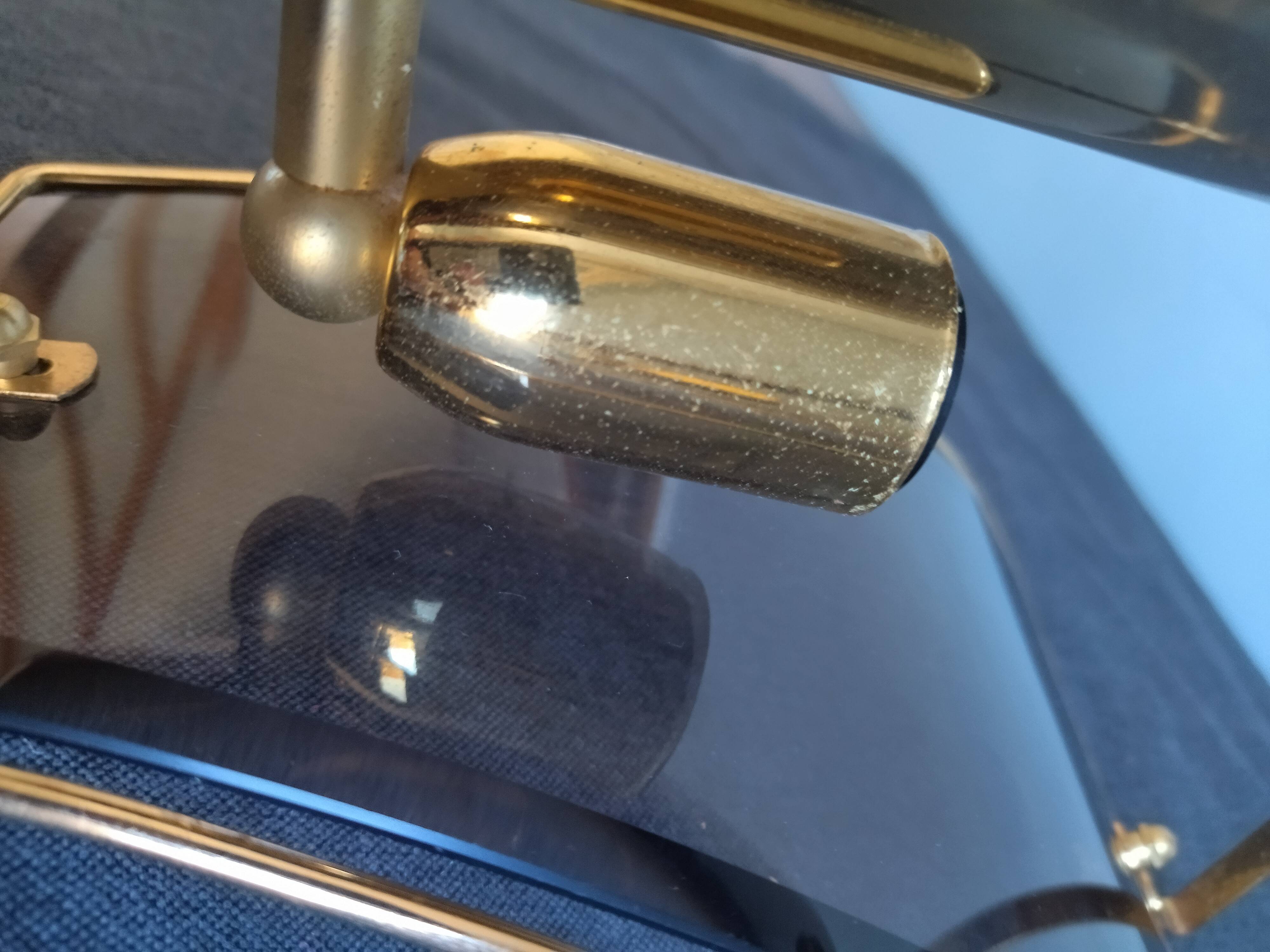 Pair of brass and curved glass wall lamps from the 80s