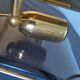 Pair of brass and curved glass wall lamps from the 80s