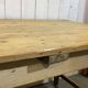 Early 20th-century farmhouse table made of fir, elm, and chestnut.