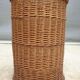 Vintage cylindrical rattan basket