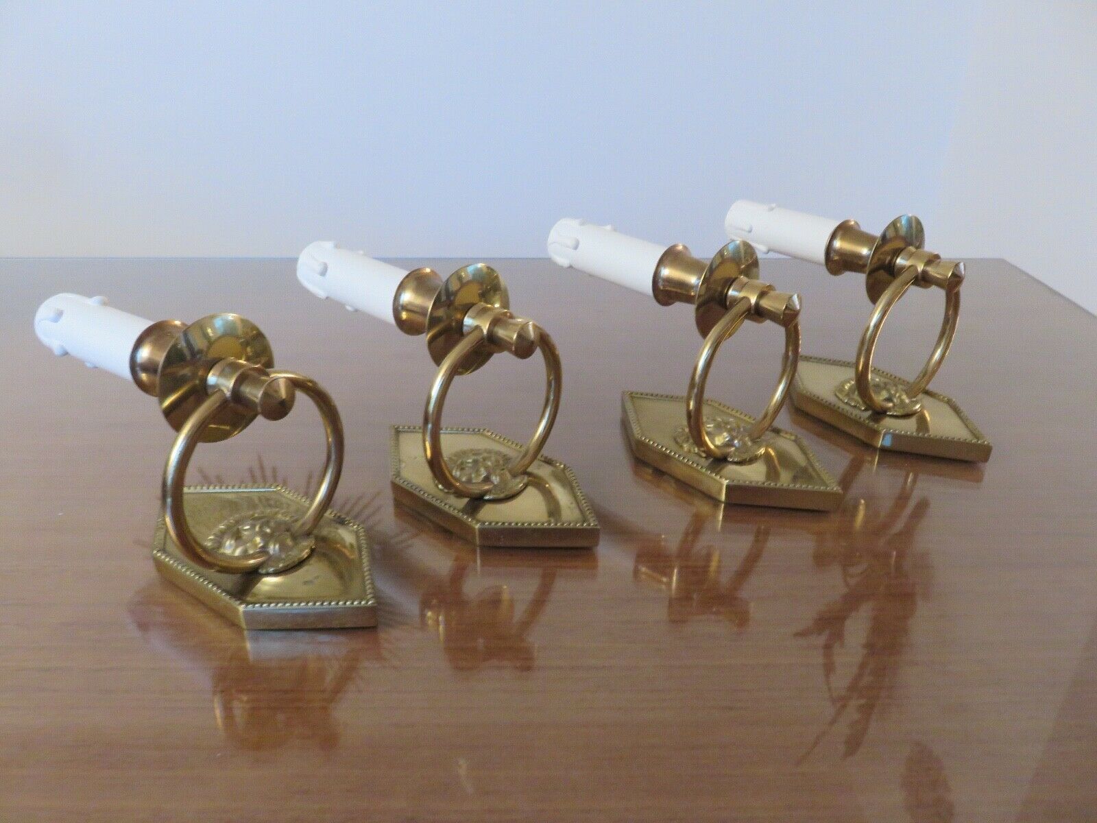 Series of 4 art deco sconces to lions in solid golden brass 40s 50s