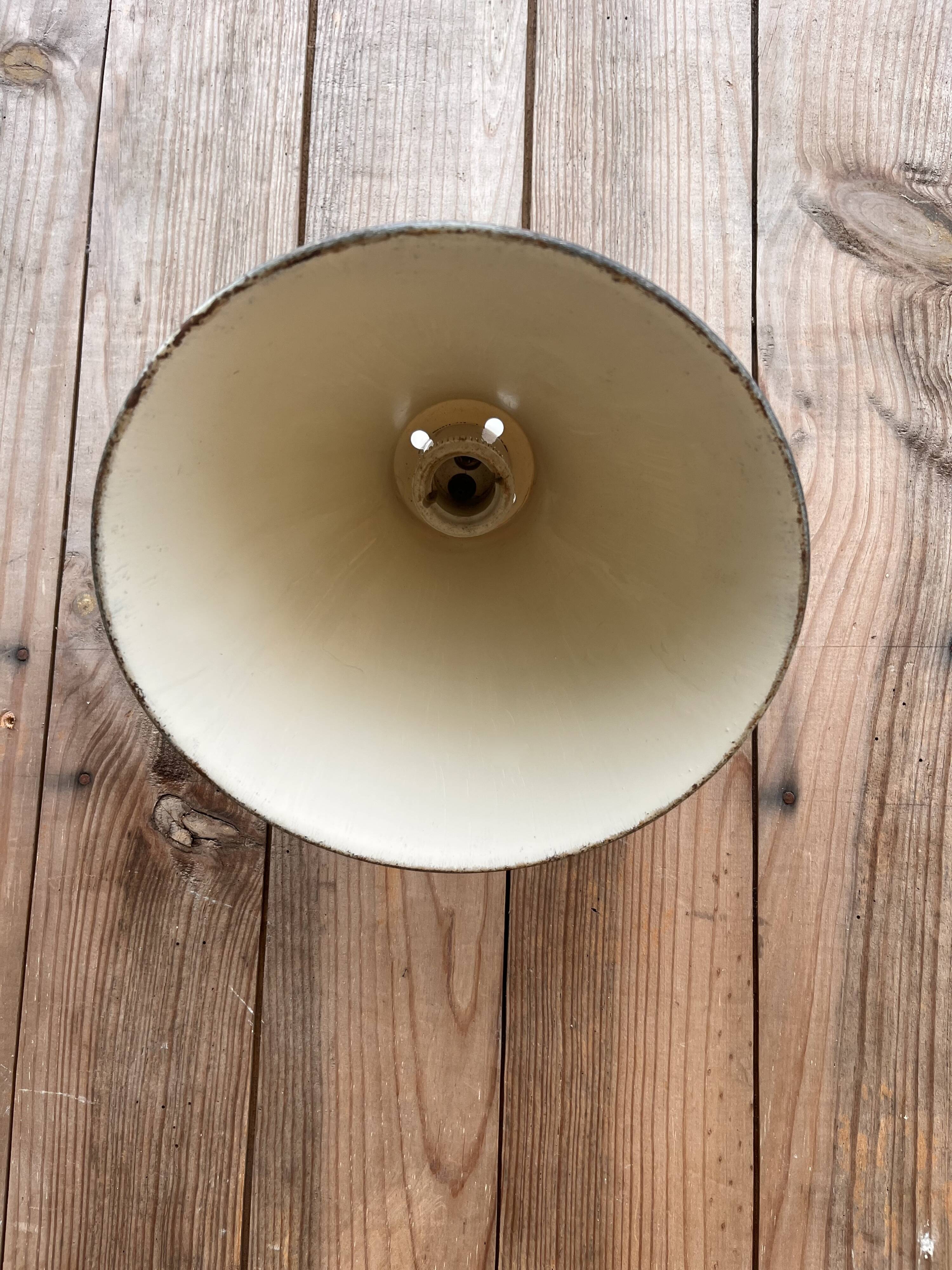 Conical wall light on porcelain base