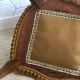 Vintage fringed gondola armchair