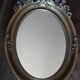 Golden Oval Mirror with Bow and Roses Decor