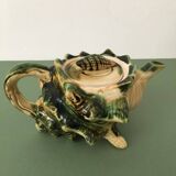 Ceramic teapot with a capacity of 0.5 liters in the shape of a shell