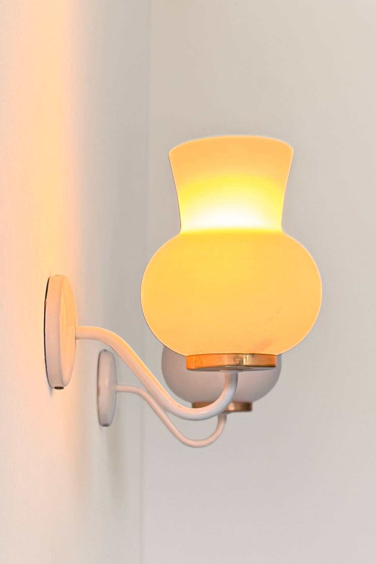 Pair of vintage wall lights in brass and opaline, France 1970.