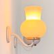 Pair of vintage wall lights in brass and opaline, France 1970.