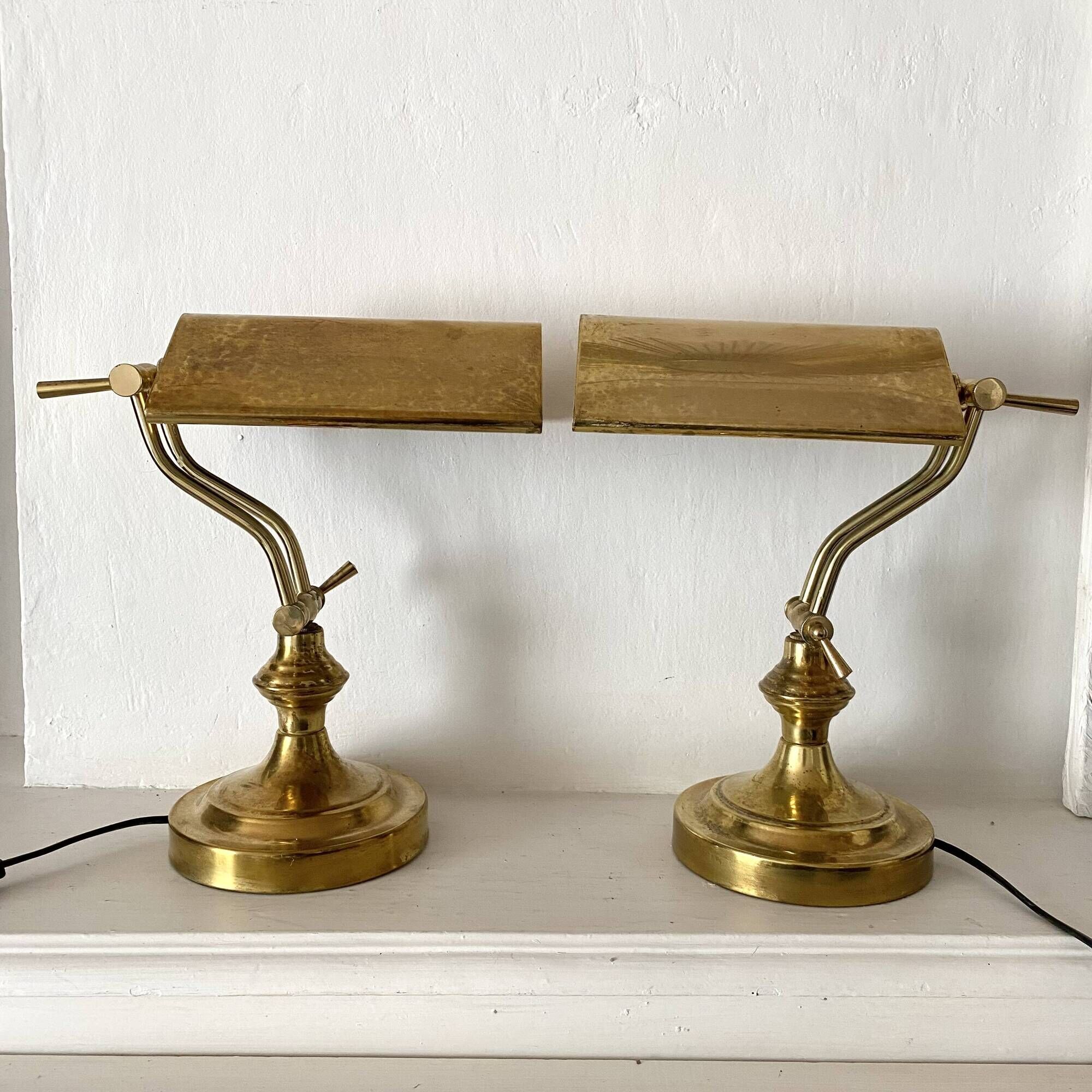 Pair of notary-style lamps in gilded metal