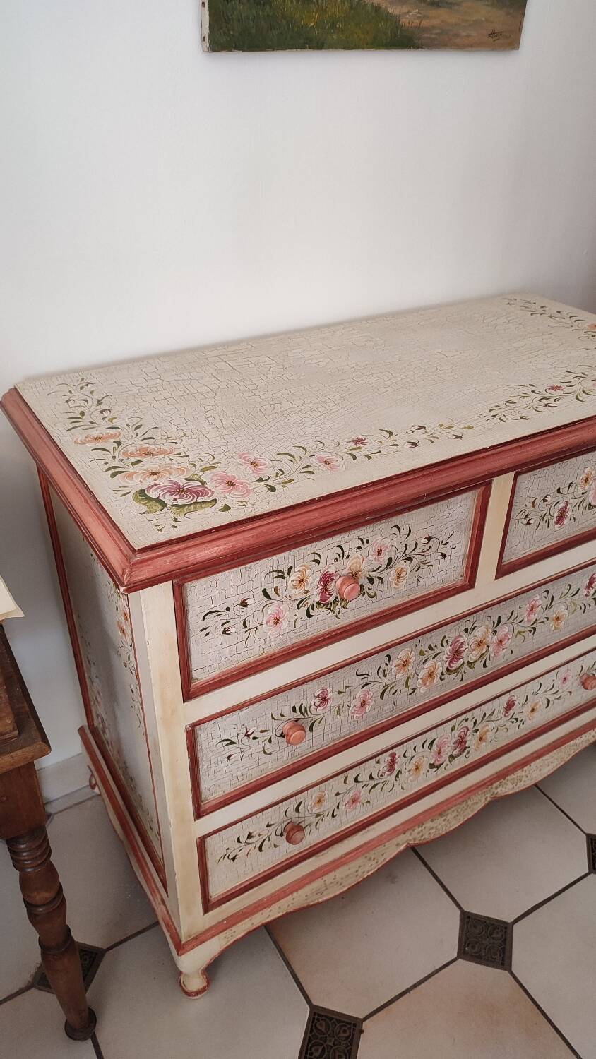 Painted chest of drawers with floral decoration