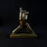 Modern sculpture of a nude woman in green ceramic, signed Carlos Nazareth
