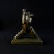 Modern sculpture of a nude woman in green ceramic, signed Carlos Nazareth