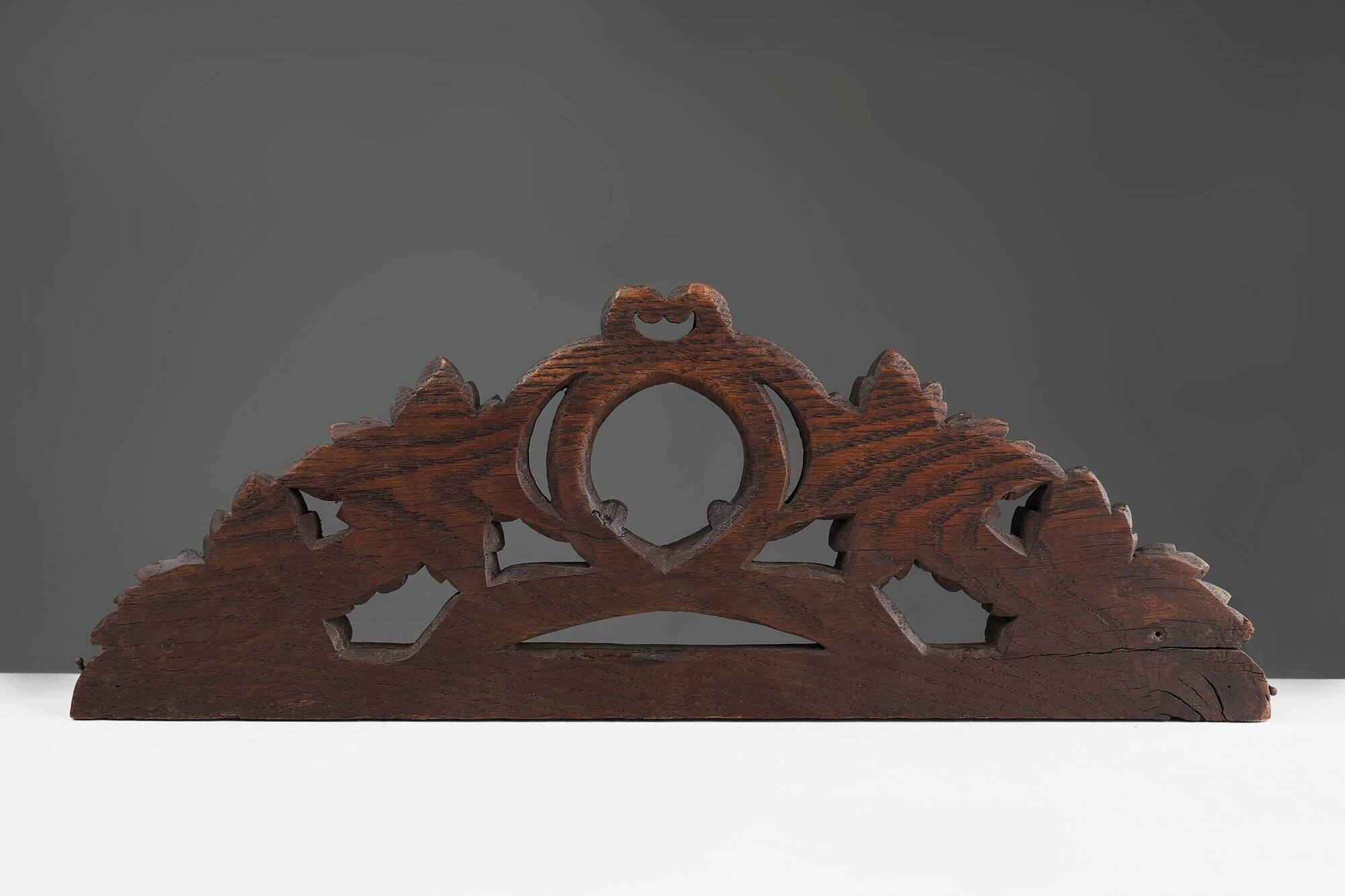 Oak pediment with hand-carved oak leaves around a wreath, France ca. 1850