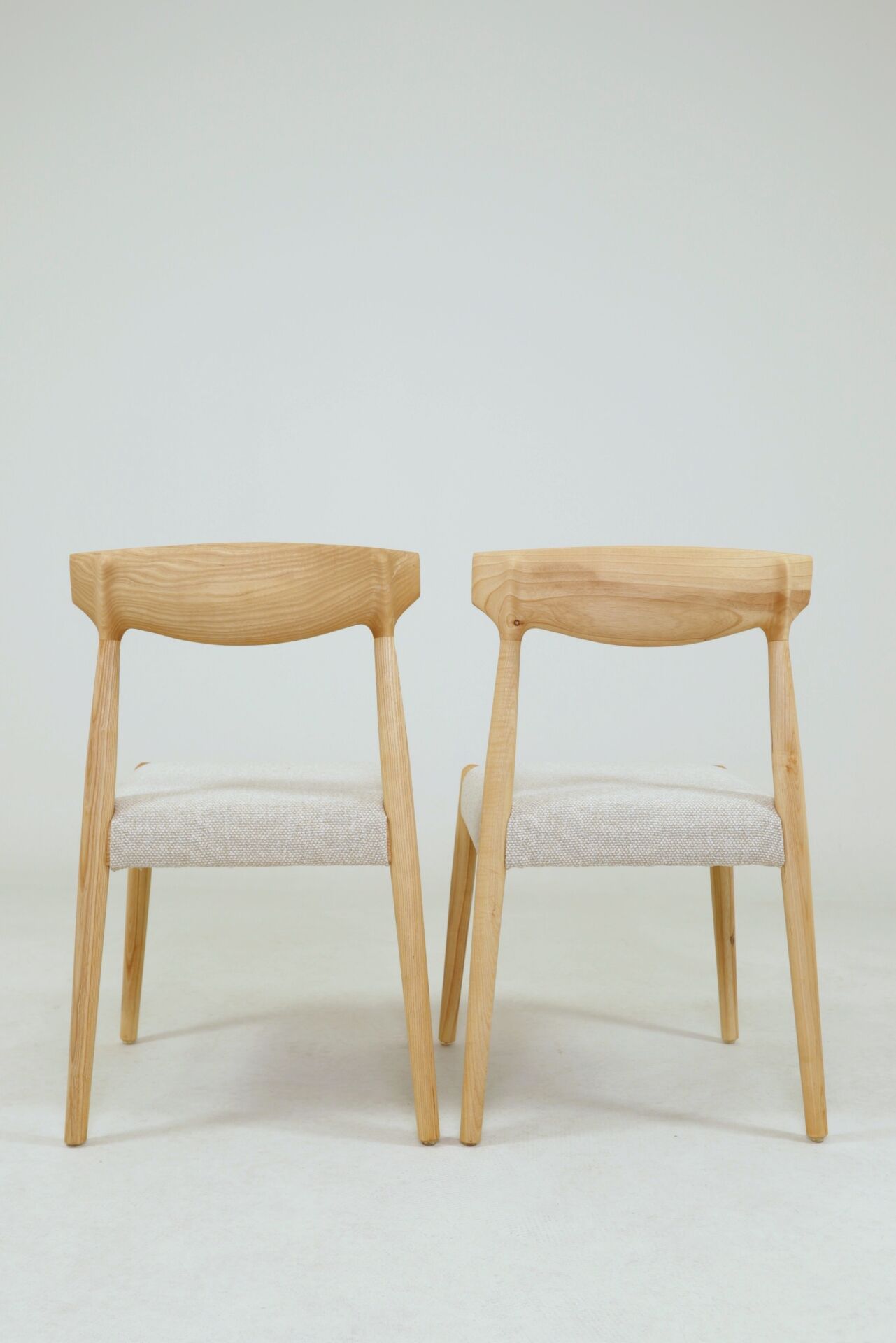 Pair of linen dining chairs