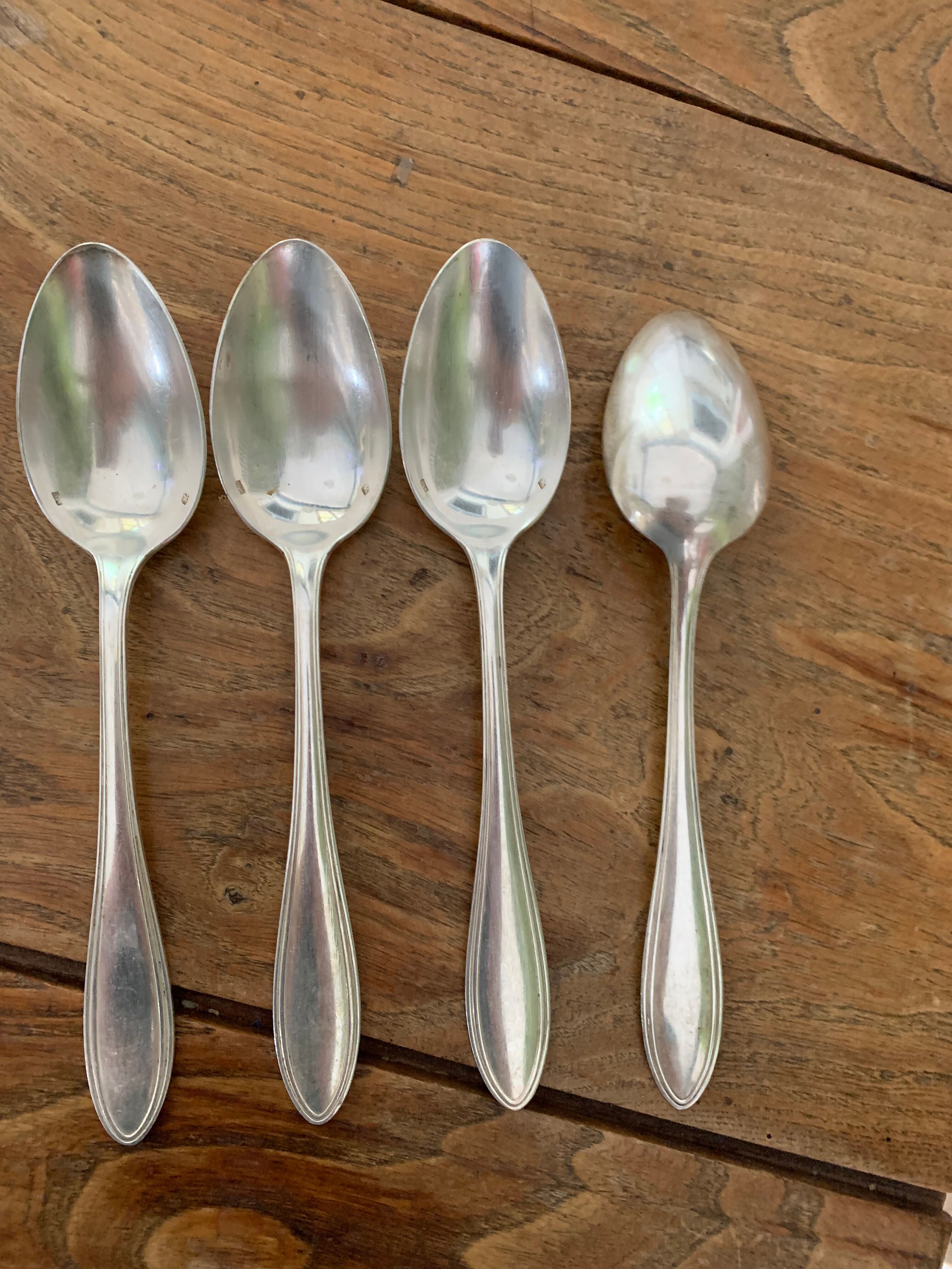 4 tablespoons in vintage silver metal