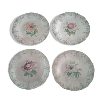 Set of 4 antique flower plates from the 19th century.