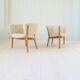 Mid-century lounge chairs in sheepskin/shearling and stained wood, Sweden, 1962.