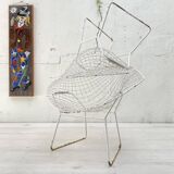 Pair of armchairs in white patinated mesh metal.