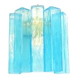Impressive contemporary sconce made with light-blue Murano glass “squared” elements. Luxury modern