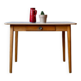 1950s Formica kitchen table with tapered legs and vintage drawer.