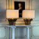 Pair of table lamps, half Corinthian capitals in carved and gilded wood, 18th century