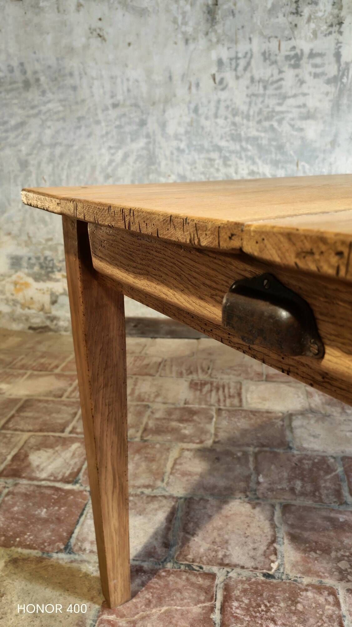 Large authentic farmhouse table made of solid French oak.
