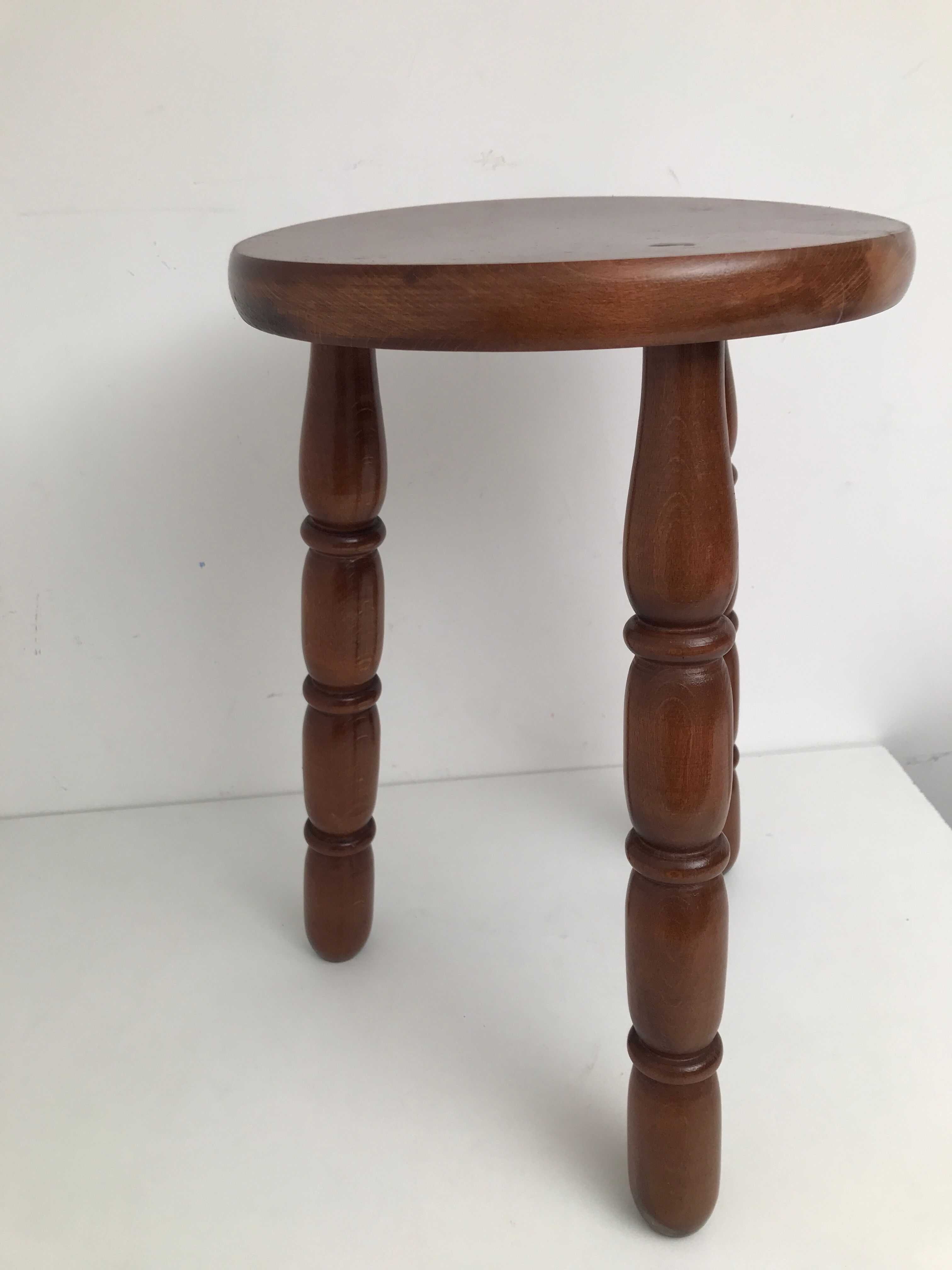 Wooden stool turned tripod foot