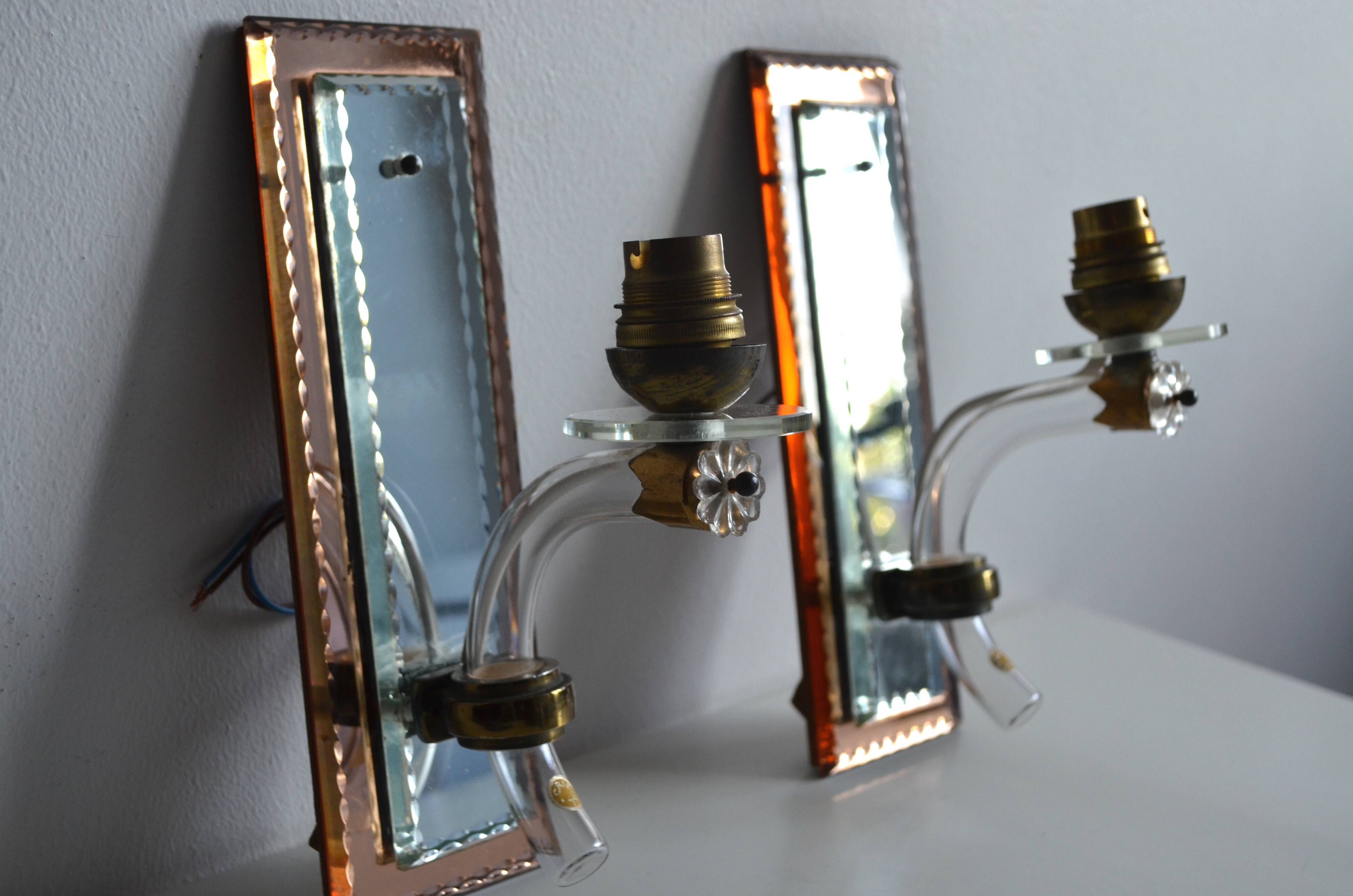 Pair of mirror and crystal wall lights from the 1940s-50s.