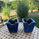 Set of two hanging pots in blue glazed ceramic.