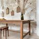 Solid wood workshop table with straight legs.