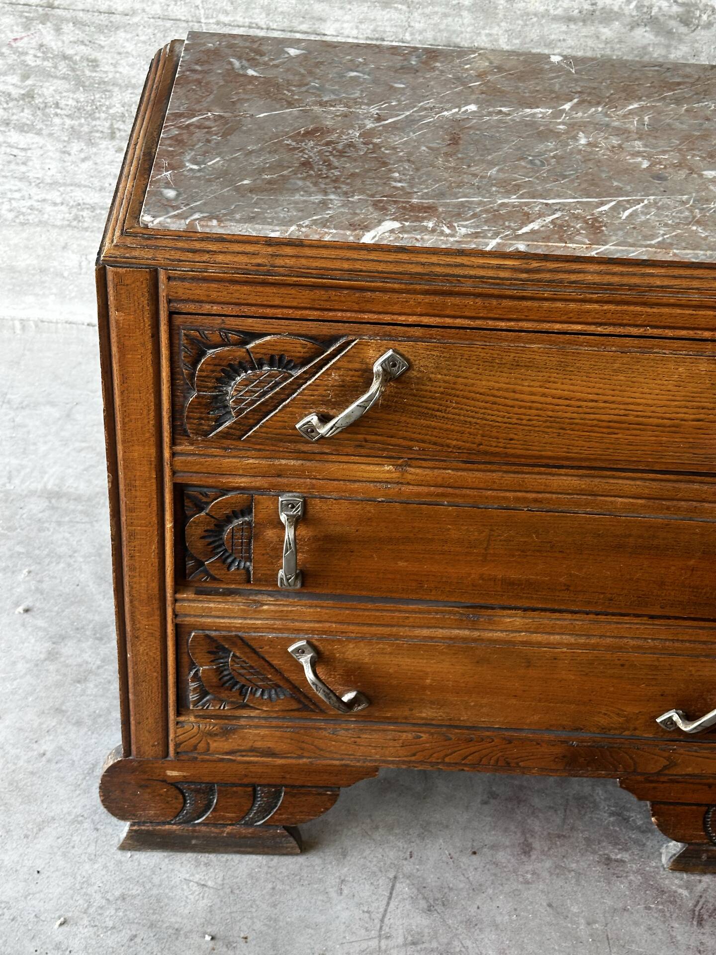 Compact Art Deco commode from the 1930s, carved wood and marble.
