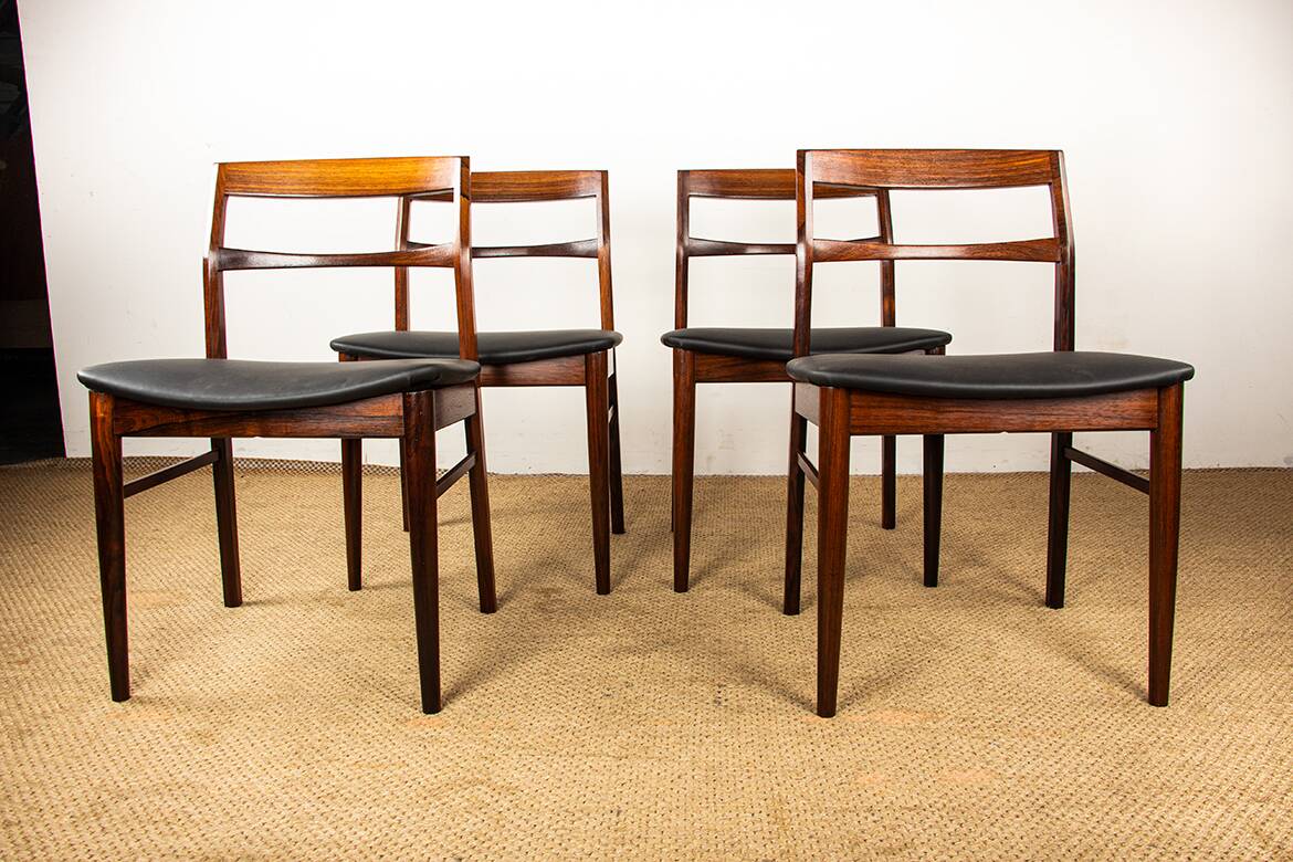 4 Danish chairs in rosewood and new leatherette by Henning Kjaernulf 1960.