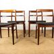 4 Danish chairs in rosewood and new leatherette by Henning Kjaernulf 1960.