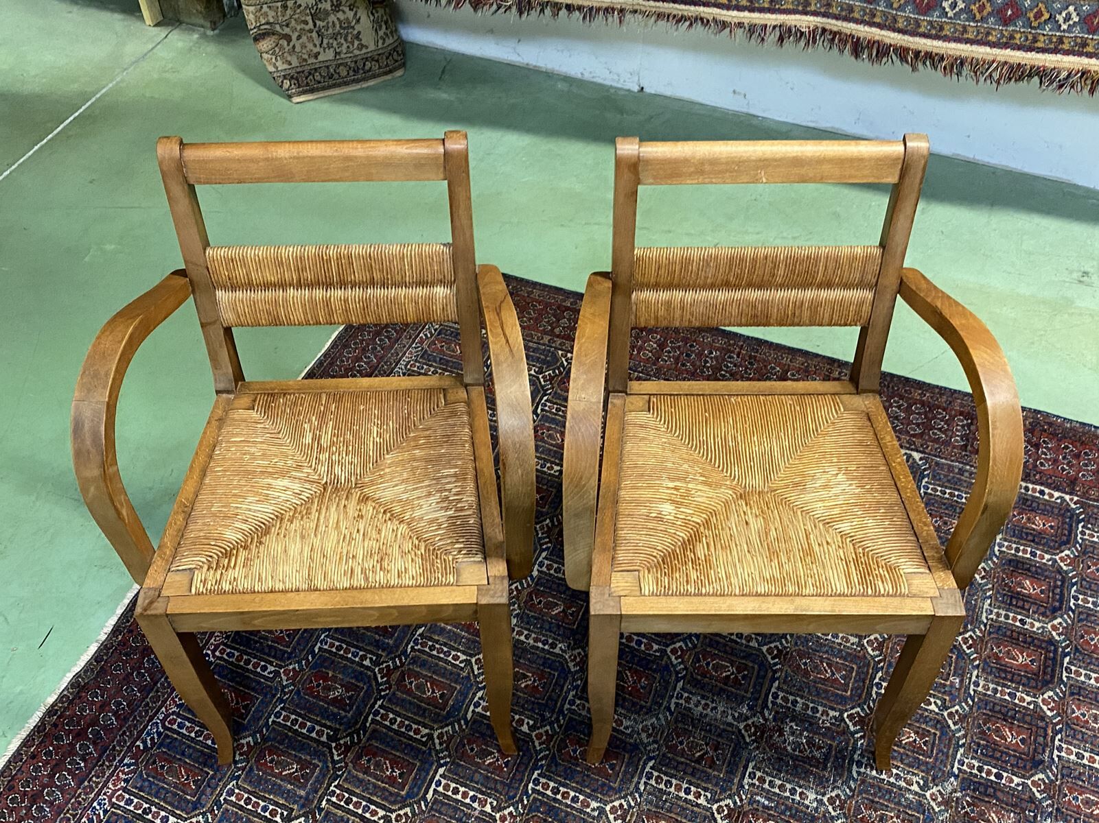 Pair of beech and straw armchairs
