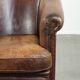 Fauteuil club en cuir de mouton vintage