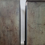 Pair of antique bedside tables with a green patina