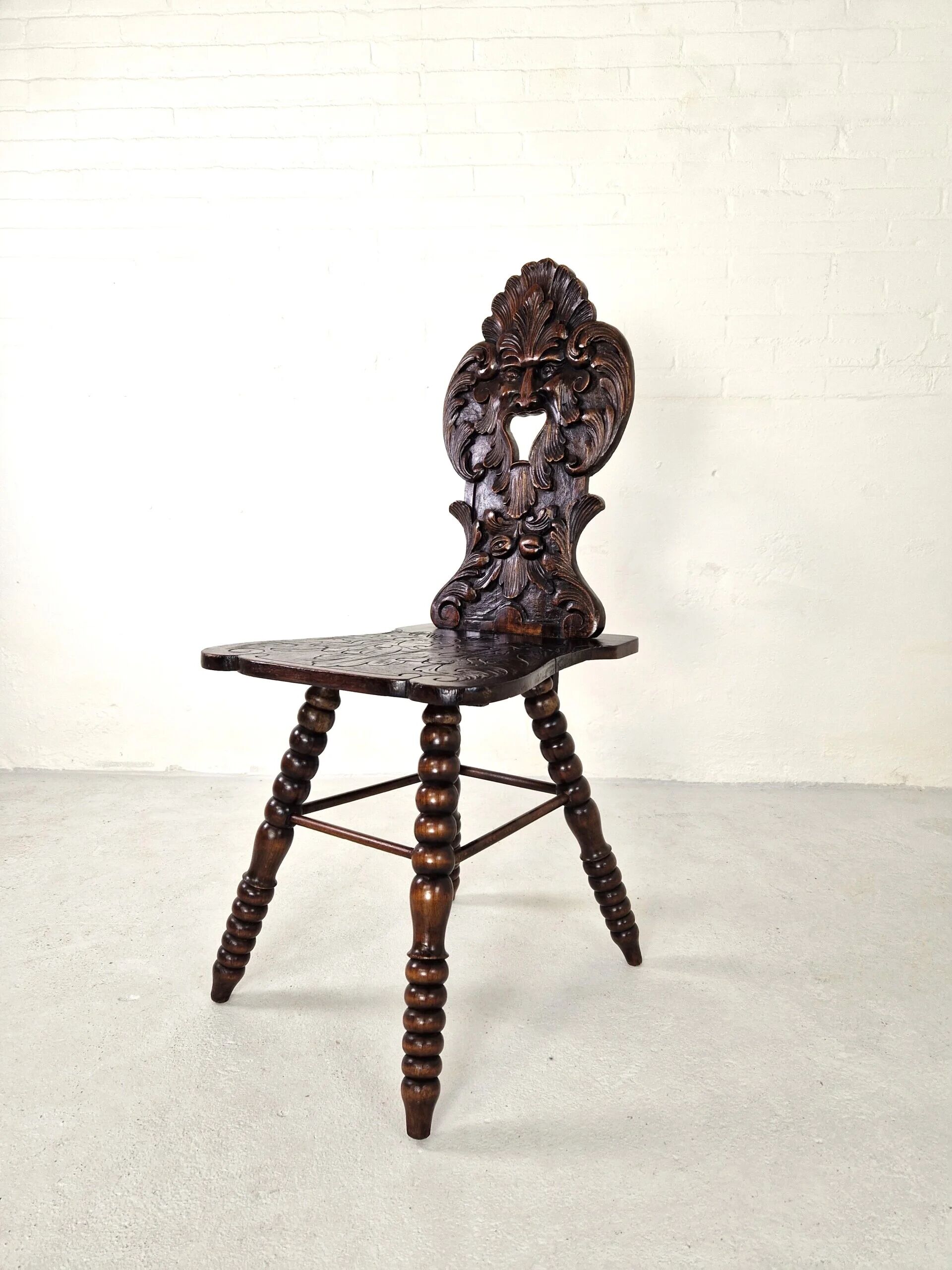 Antique Gothic hall chair with bobbin legs