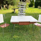 White Formica table with extensions and 2 designer chairs