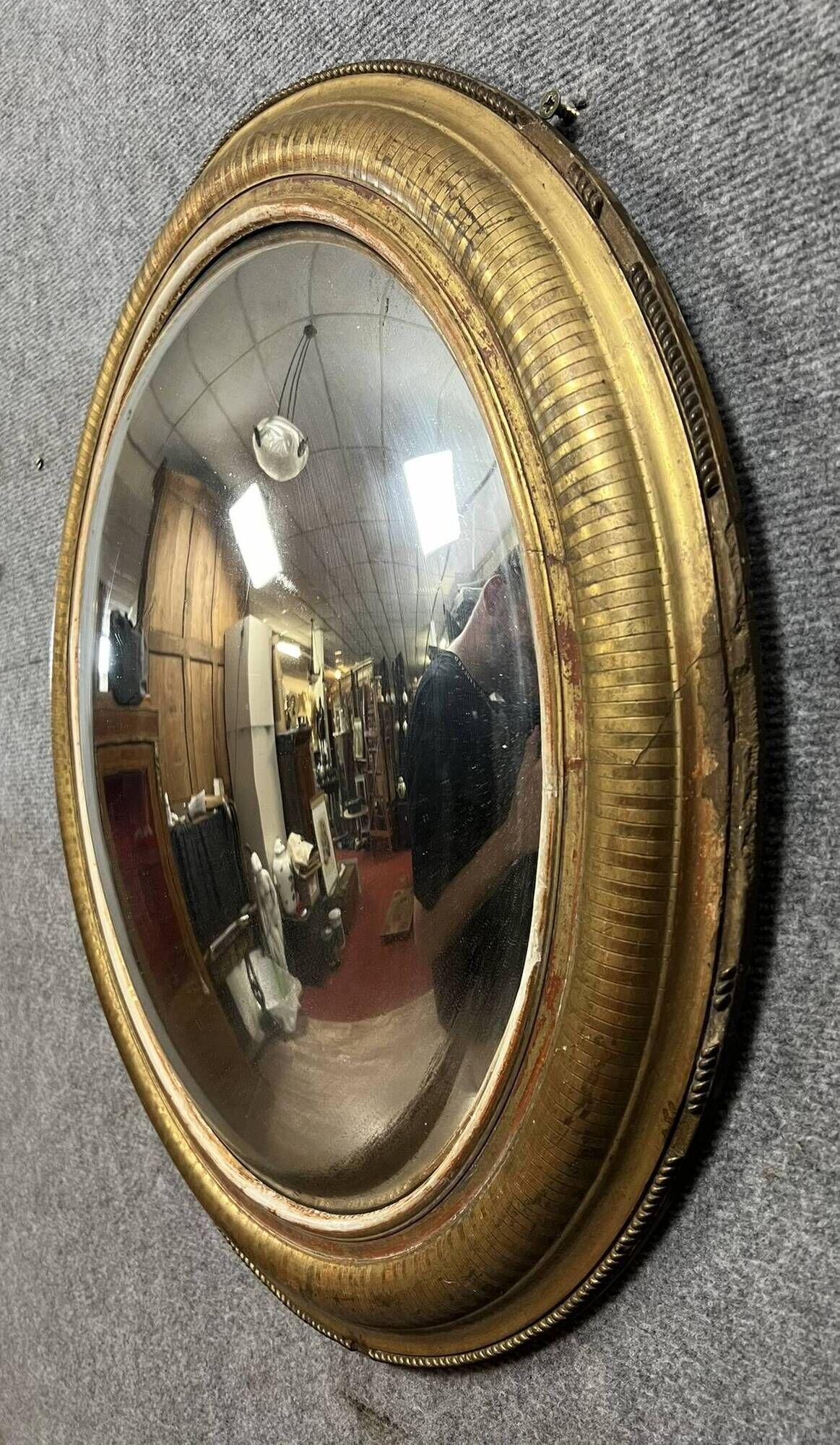 Oval mirror called “witch’s eye” in gilded wood in Louis XVI style circa 1850