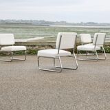 4 chauffeuses formant canapé modulable. acier, simili-cuir, années 70