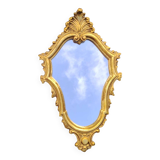 Classic Baroque/Louis XV style mirror. In old gold patinated wood. Palmette/Scroll/Blazon motif decor. Dim 46 x 27 cm