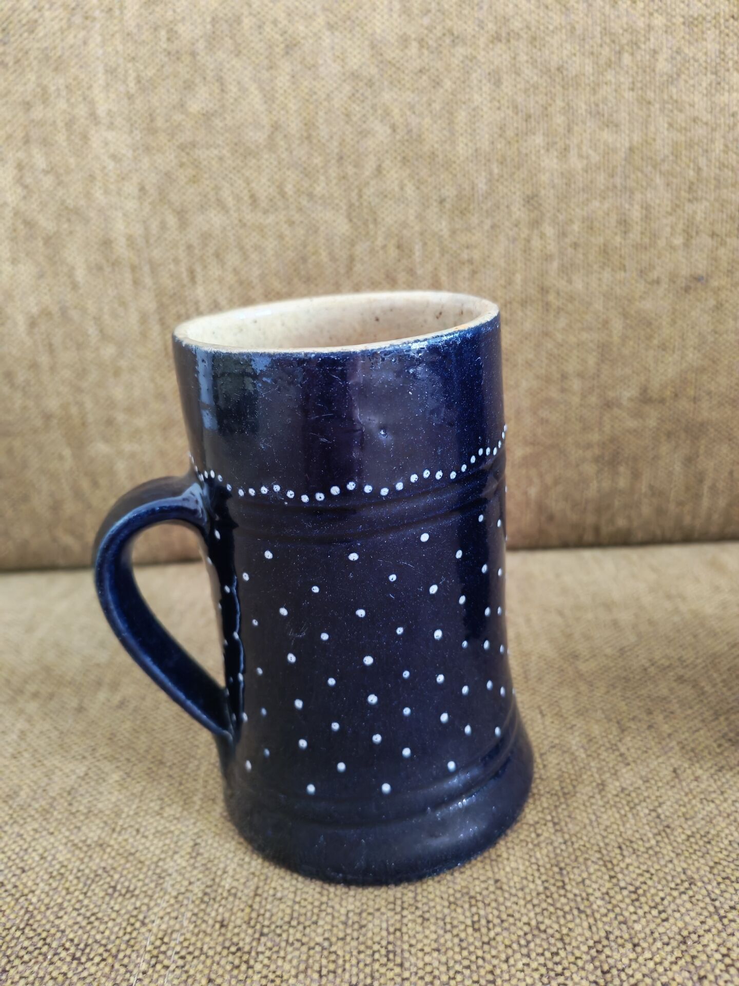 Two vintage mugs in traditional German earthenware.