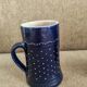 Two vintage mugs in traditional German earthenware.
