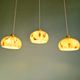 Trio of Art Deco pendant lights in marbled opaline glass, 1920s-30s