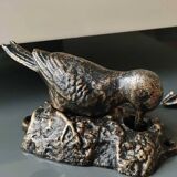 Door knocker/knocker. Woodpecker on tree trunk. In cast iron with a golden patina