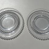 Head to head of crystal plates, Andlau model, signed Lalique