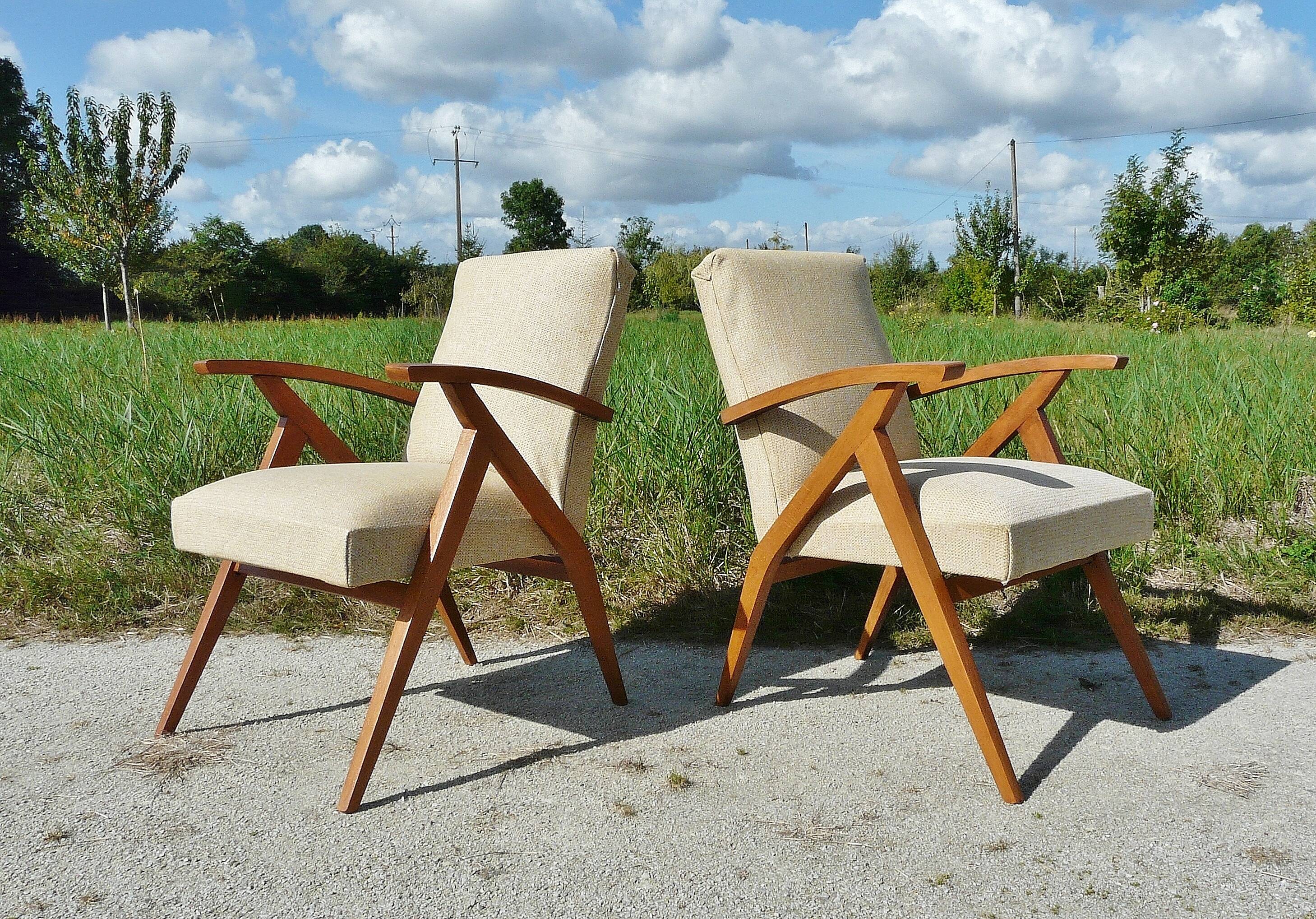 Pair of Scandinavian vintage armchairs in blond wood