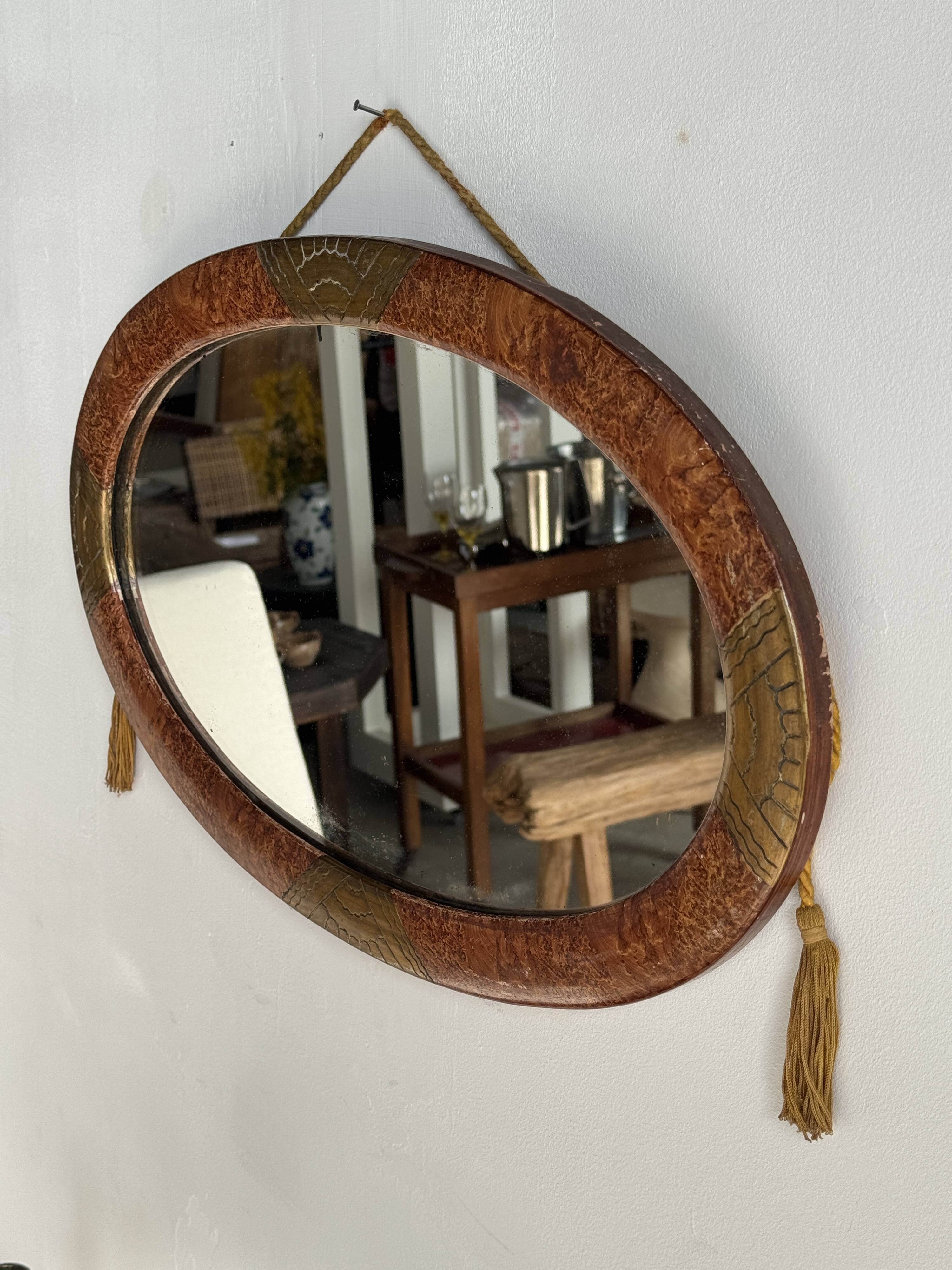 Small oval Art Deco mirror in brown and gold 33x54.